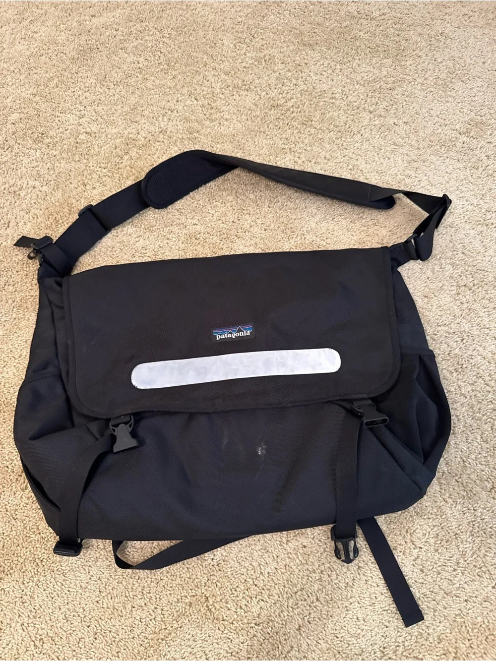 Patagonia Black Messenger Bag with Silver Reflective Strip